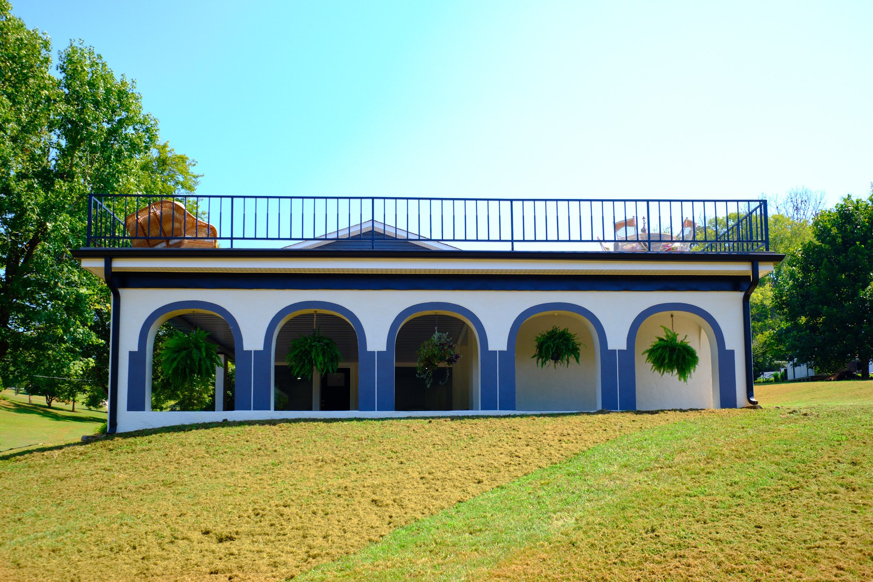 Distinctive lower-level arches beneath the deck